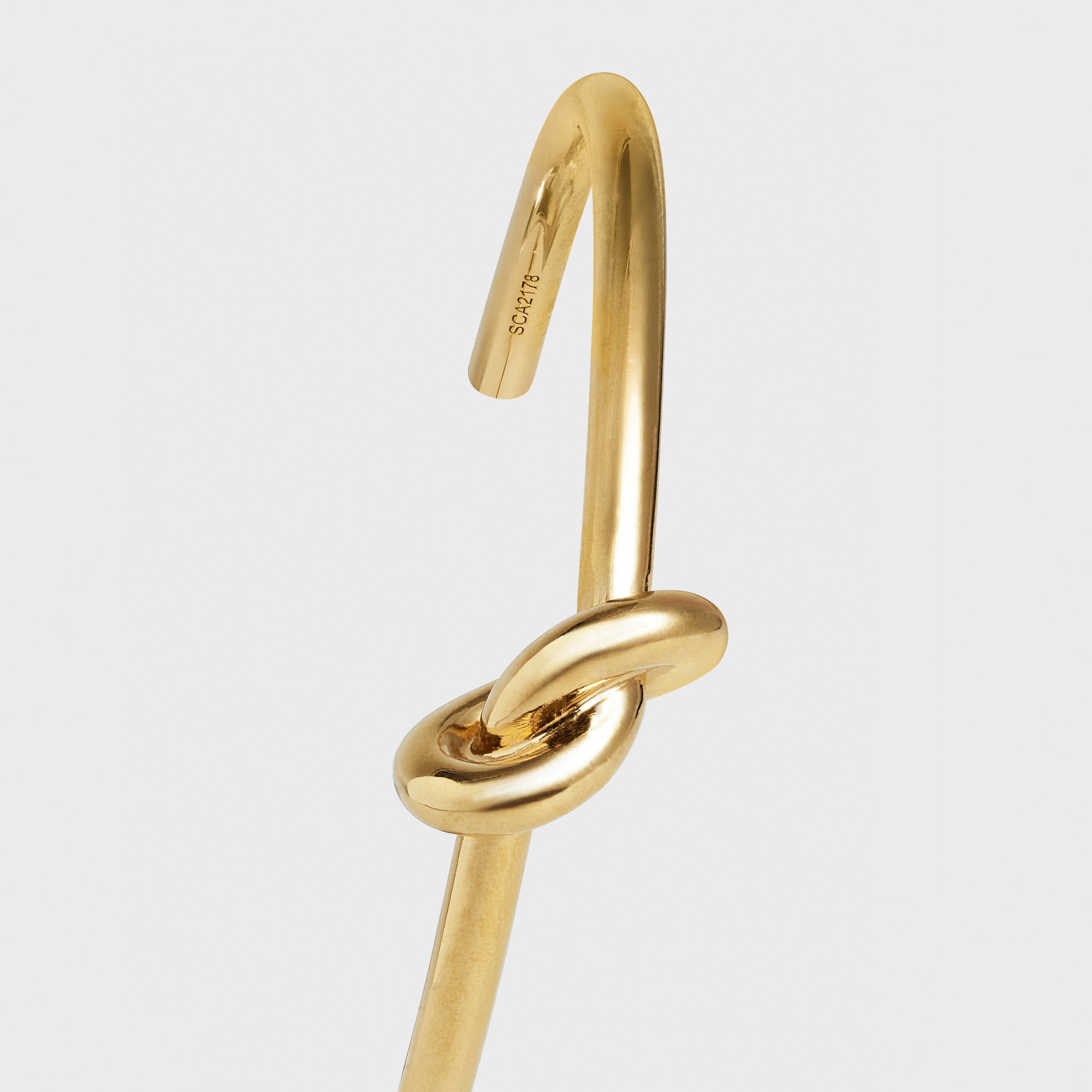 Gold knot bracelet celine best sale